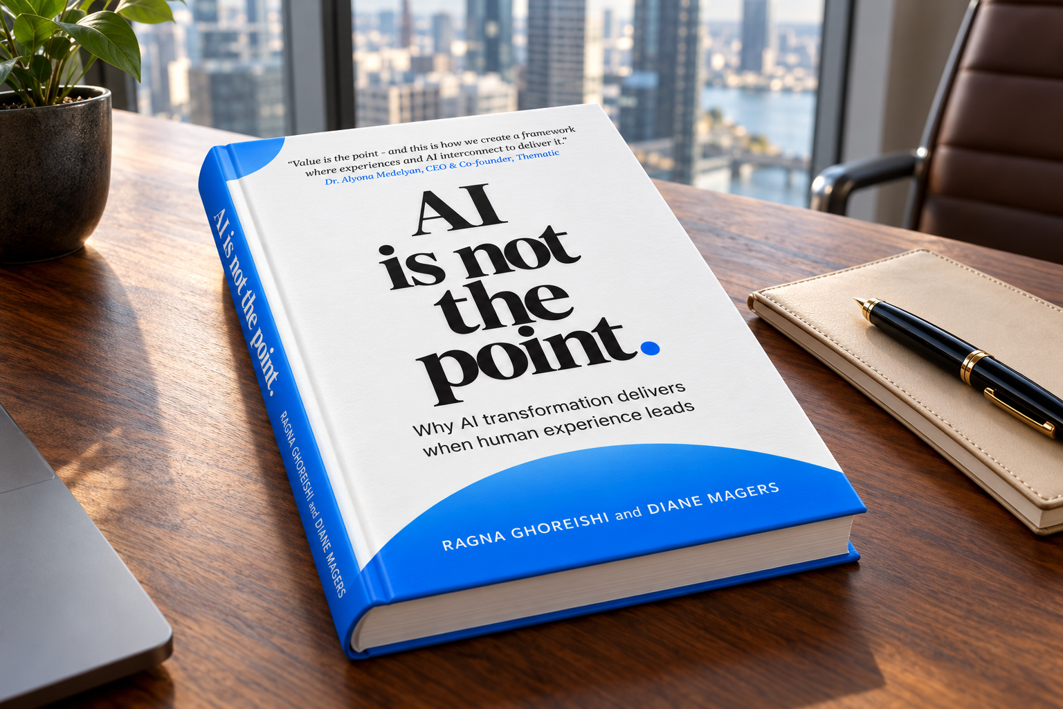 The book on a wooden desk in an office, a city skyline behind it
